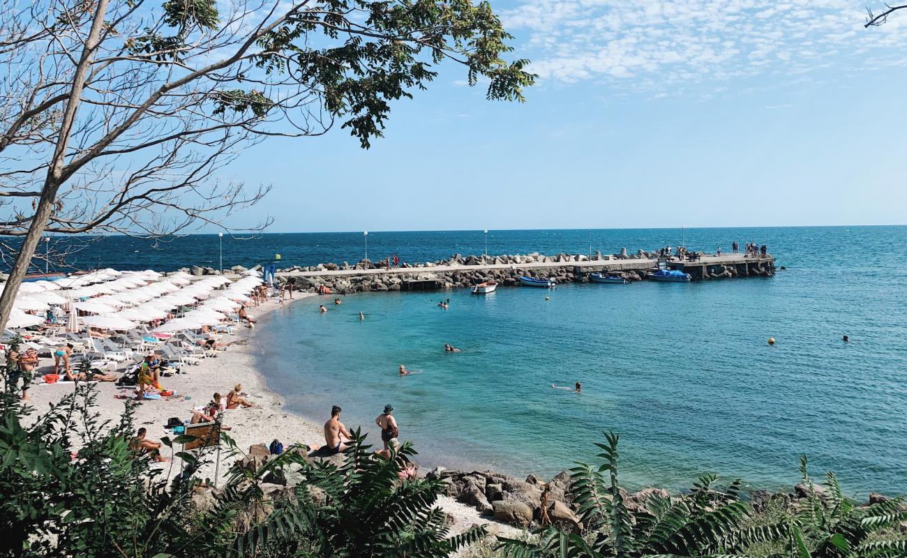 Foto af Buna beach med lys skaldesand overflade