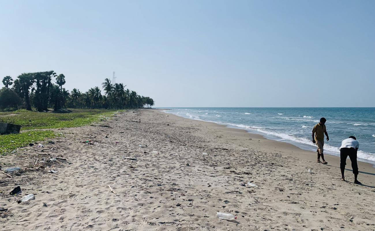 Foto af Kovalam Beach med lys sand overflade