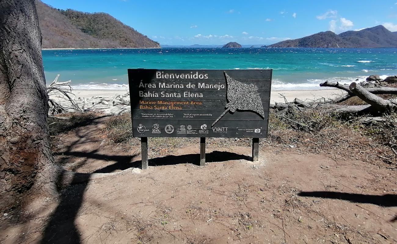 Foto af Sortija beach med let sand og småsten overflade