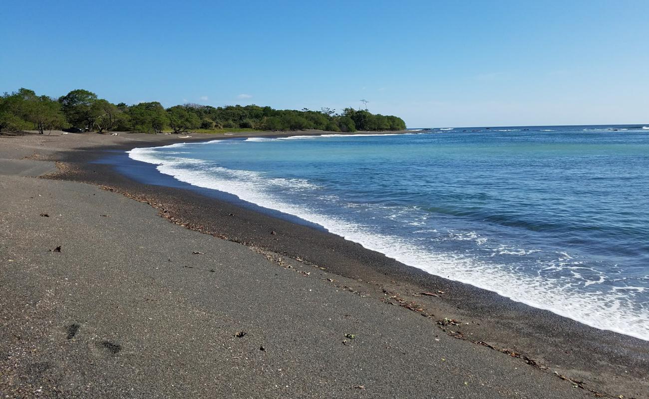 Foto af Frijolar Beach med gråt sand og sten overflade