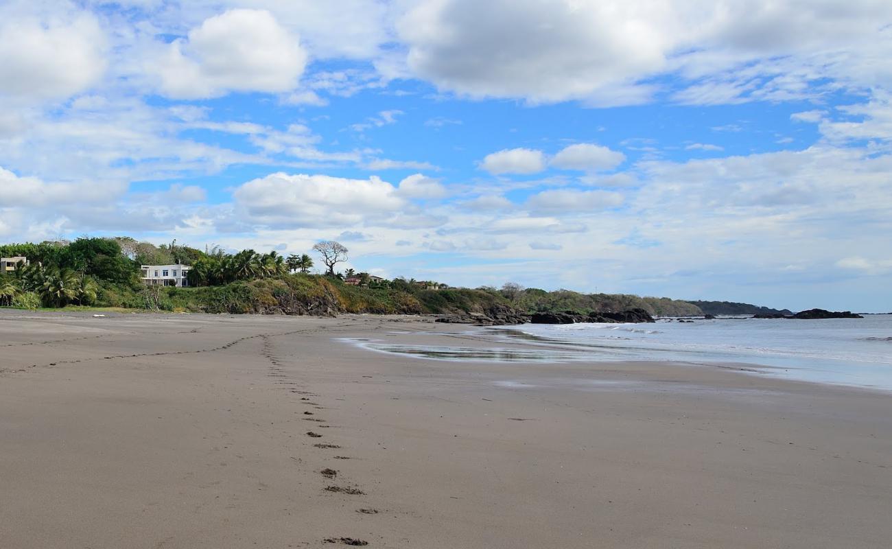 Foto af Playa Azul med gråt sand og sten overflade