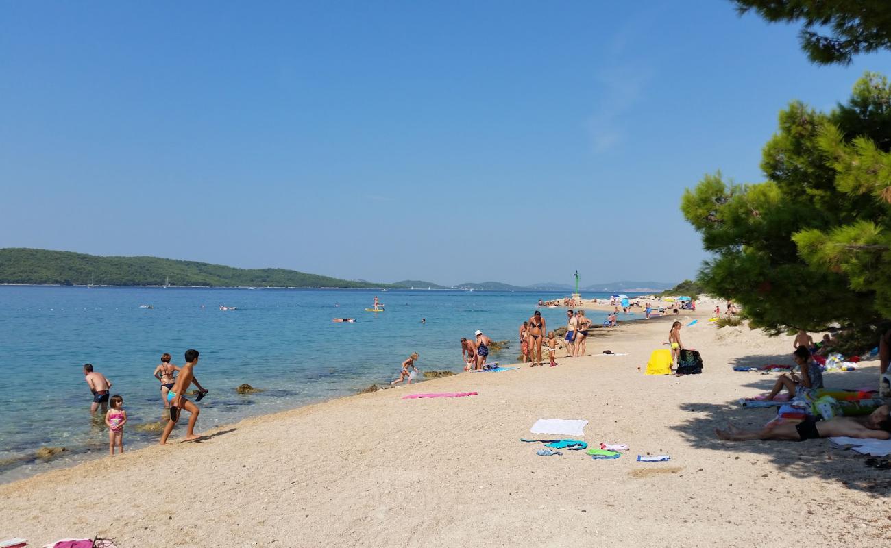 Foto af Solaris beach II med let sand og småsten overflade