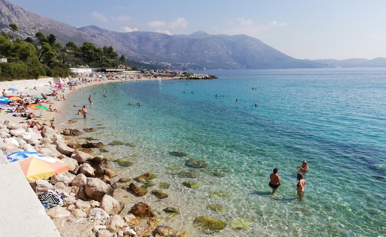 Foto af Kupari beach med let fin sten overflade