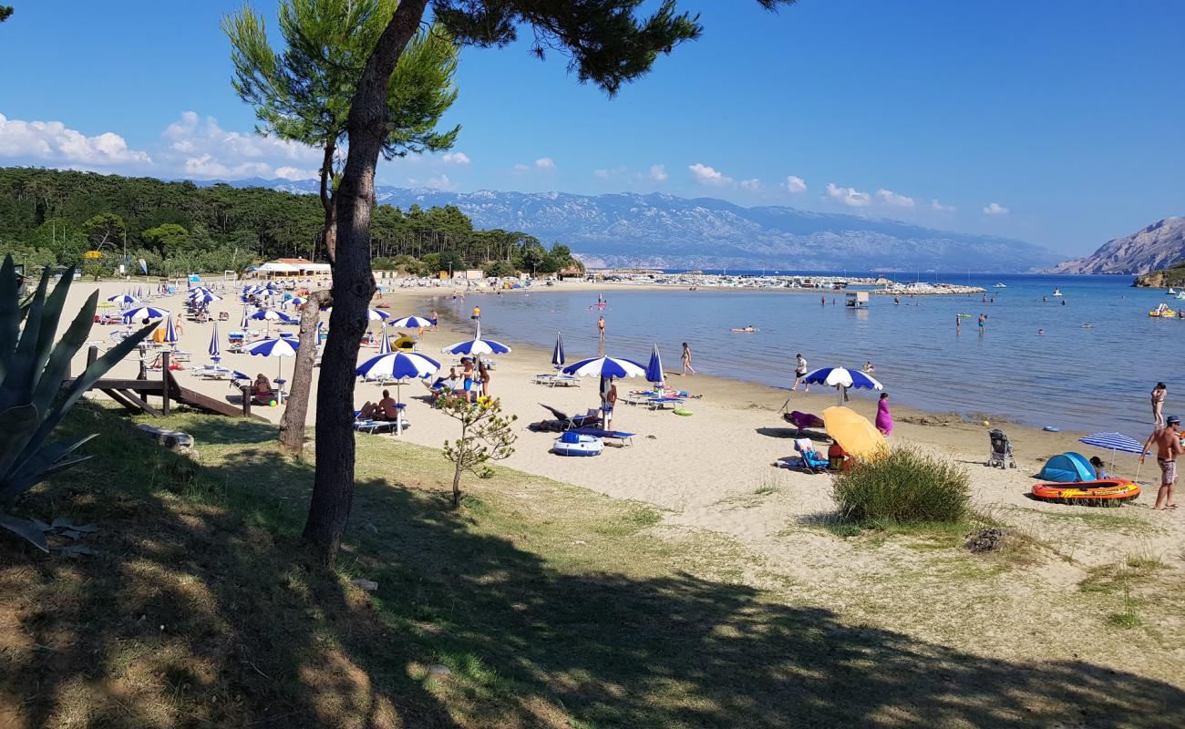 Foto af Paradis Strand med lys sand overflade