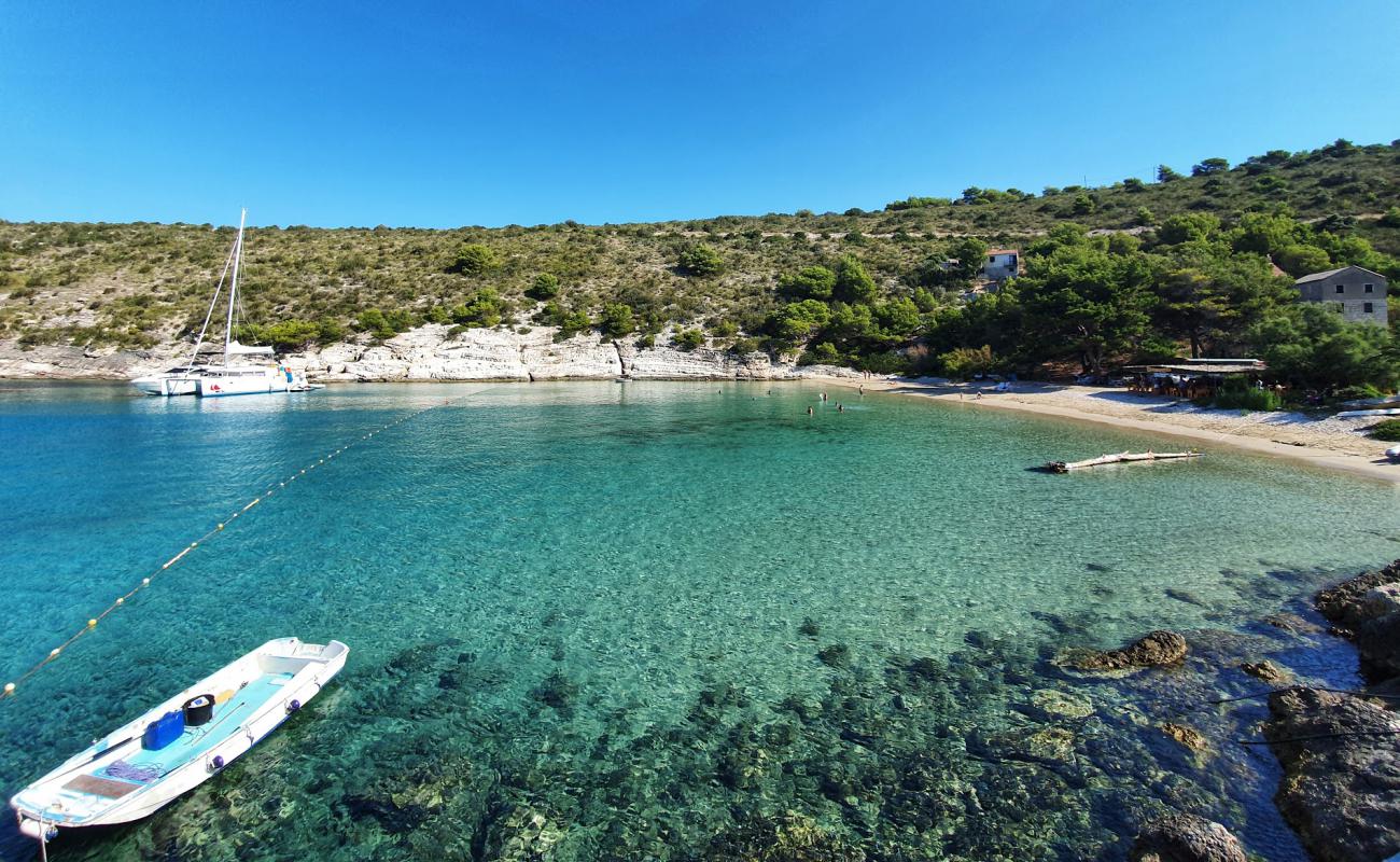 Foto af Porat beach med brunt sand overflade