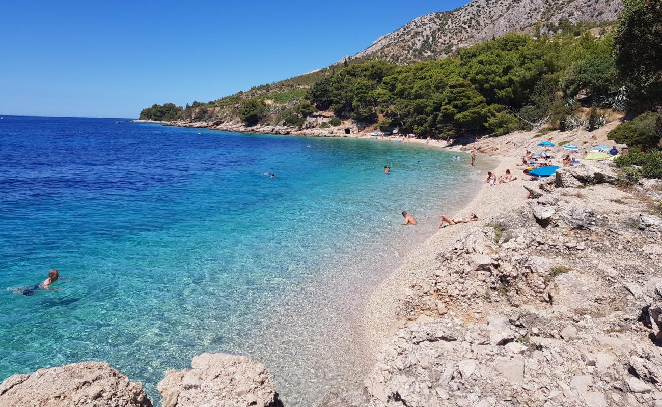 Foto af Murvica Strand med let fin sten overflade