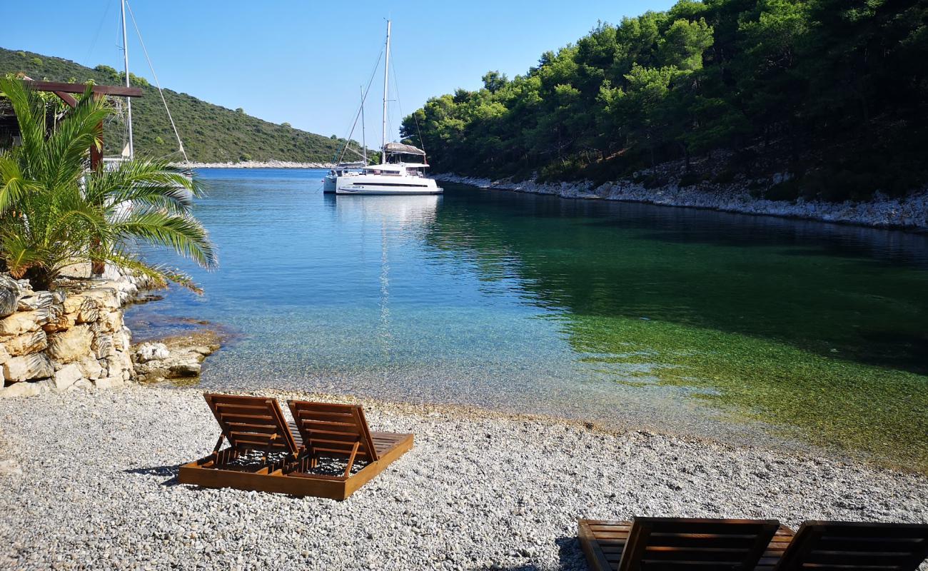 Foto af Calma beach II med grå fin sten overflade