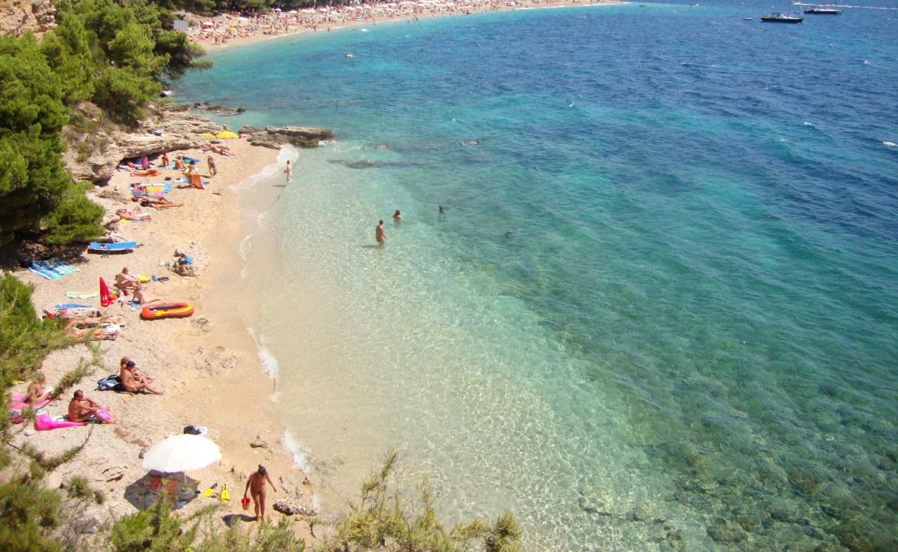 Foto af Paklina FKK Beach med let sand og småsten overflade