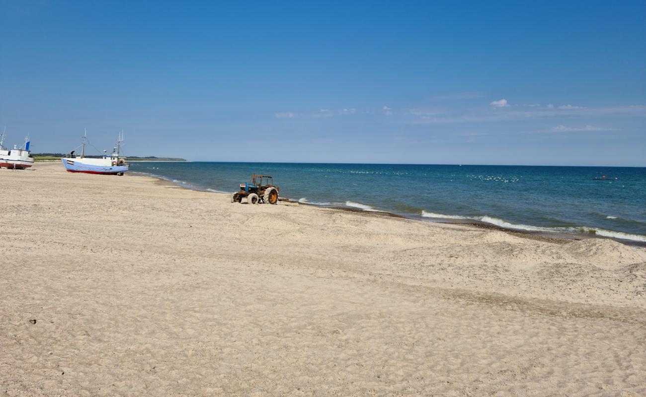 Foto af Thorup Strand med let sand og småsten overflade