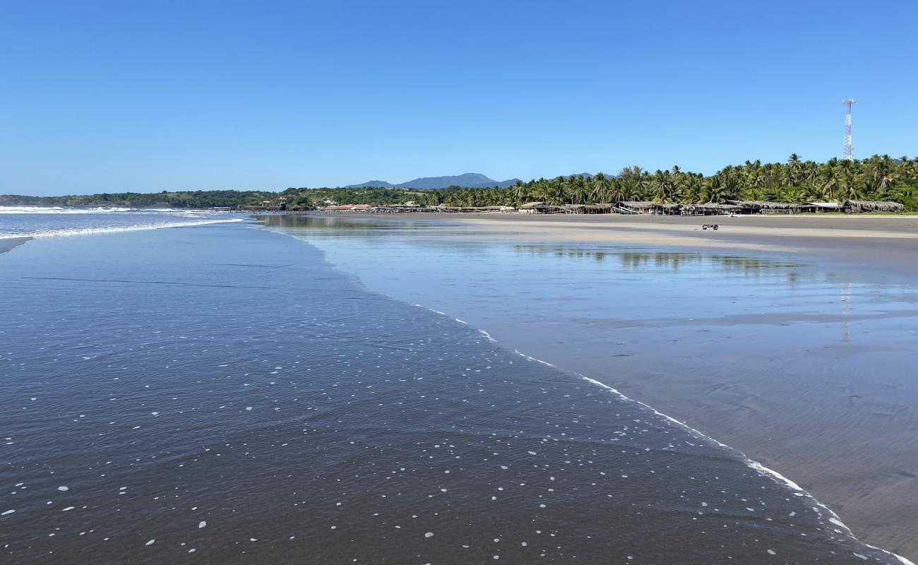 Foto af Playa El Cuco med grå sand overflade