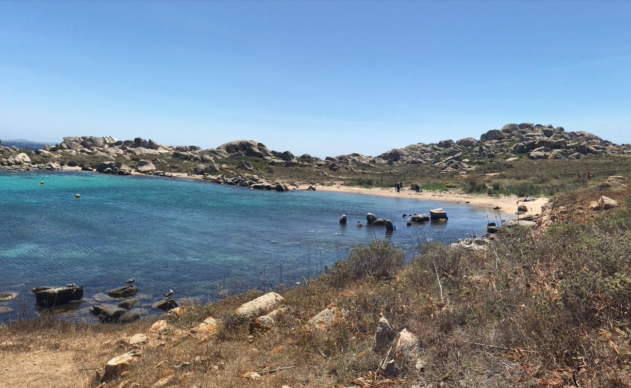 Foto af Cala Sderenaia Stranden med turkis rent vand overflade