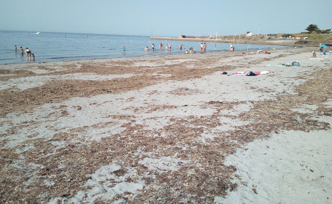 Foto af Port aux Moines med grå sand overflade