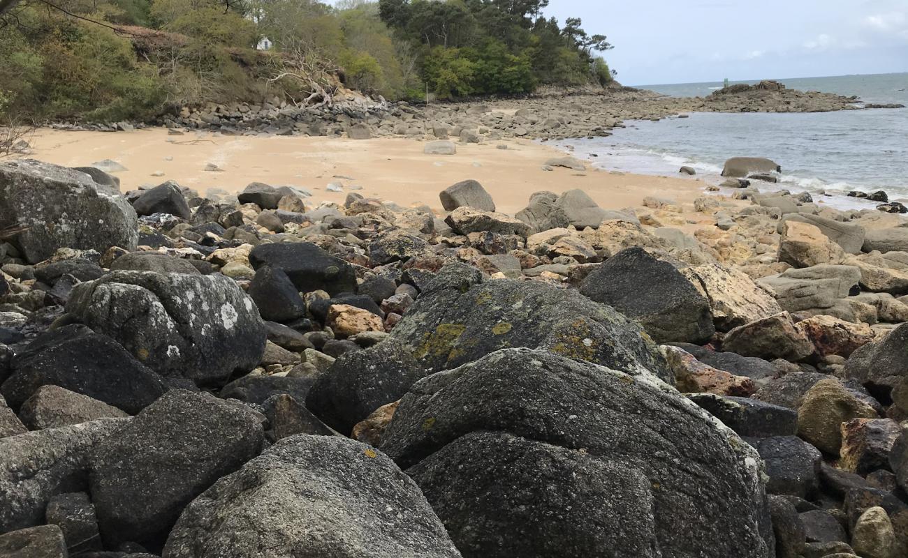 Foto af Plage enclavee med lyst sand & sten overflade