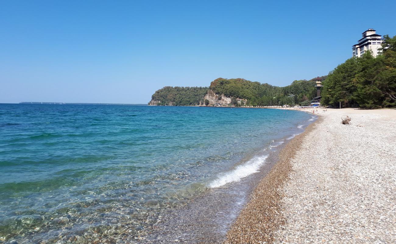 Foto af Miussera beach med let sand og småsten overflade