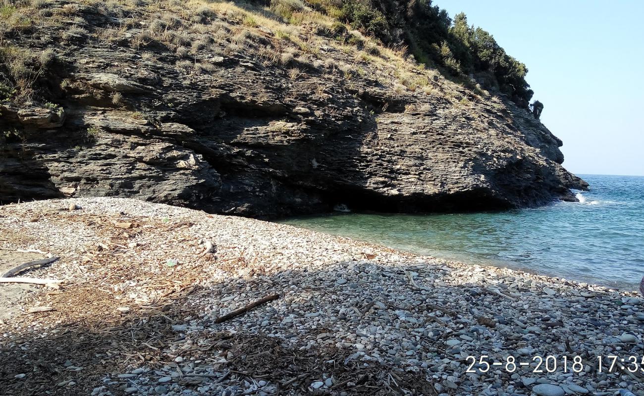 Foto af Placa wild beach med let sand og småsten overflade