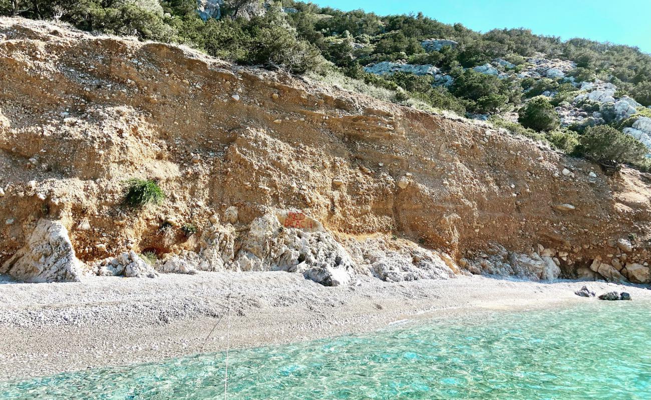 Foto af Porto Germeno secret beach med grå sten overflade