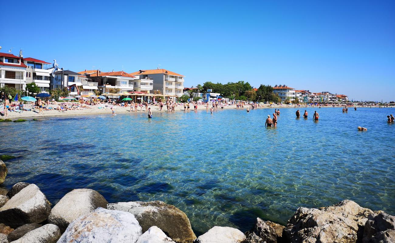 Foto af Paralia Kolimvisis med grå sand overflade