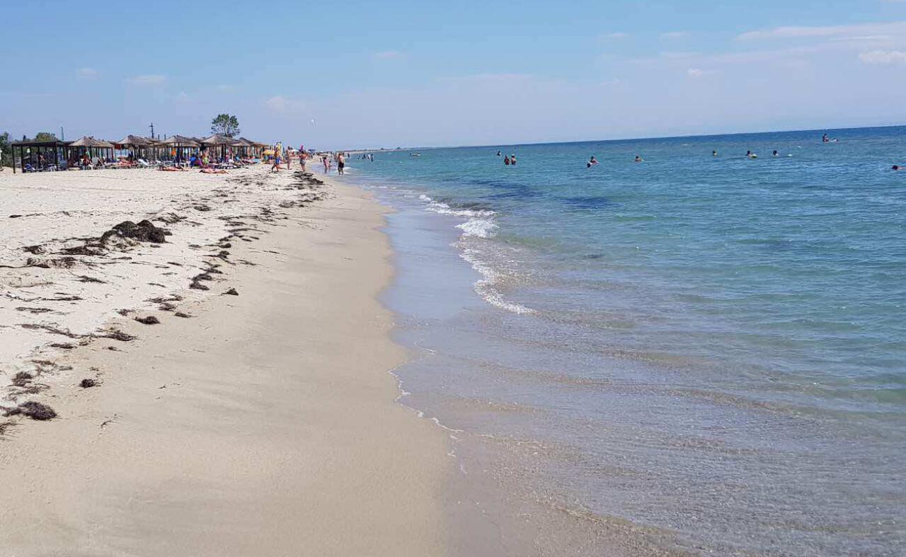 Foto af Korinos beach med lys fint sand overflade