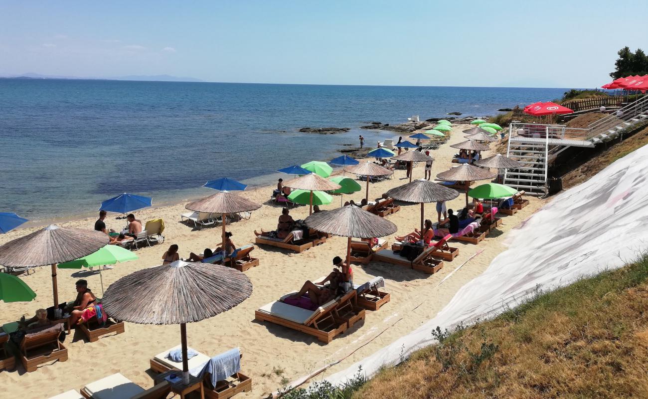 Foto af Paralia Porto Molo med lys sand overflade