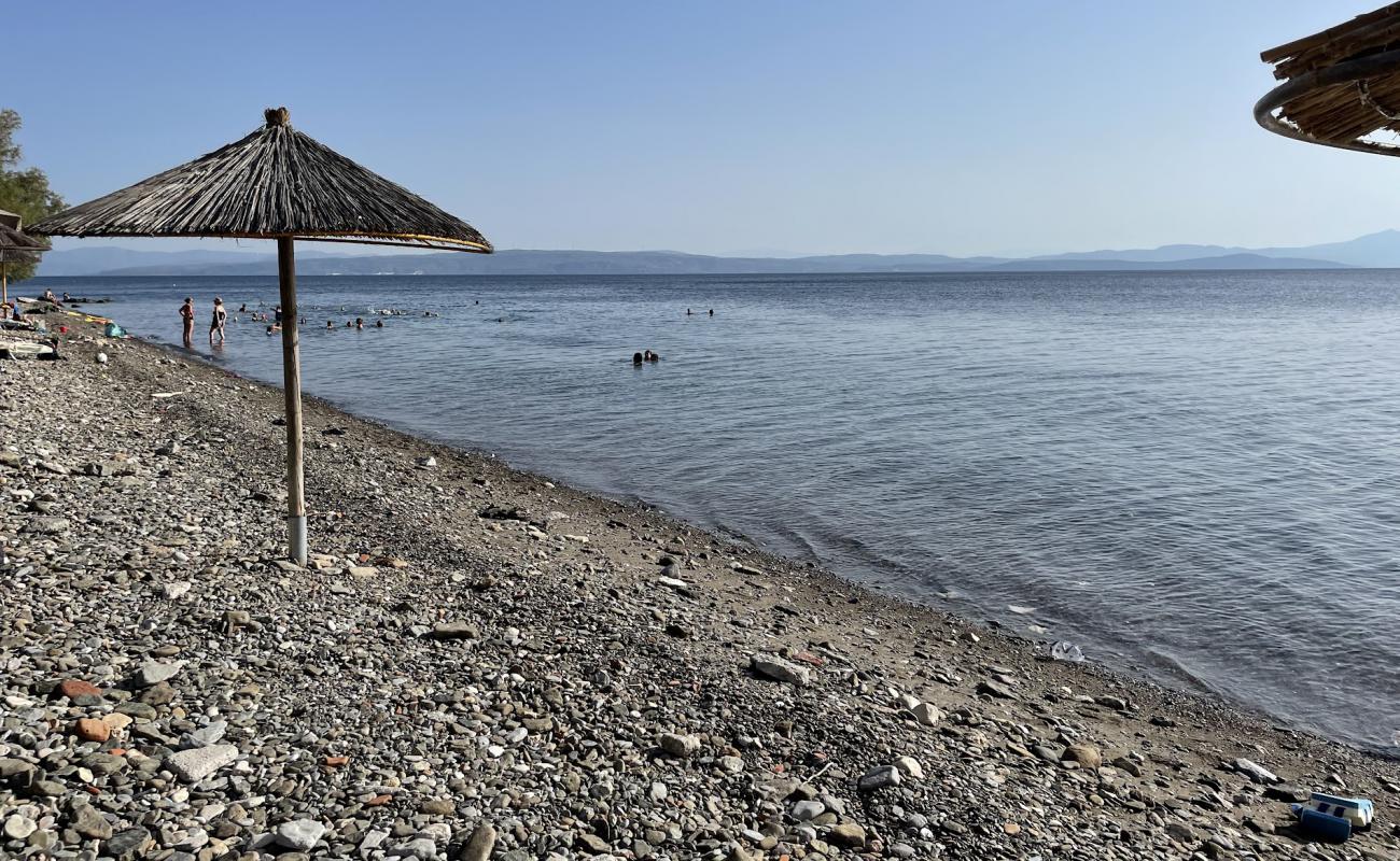 Foto af Kioski Beach med gråt sand og sten overflade