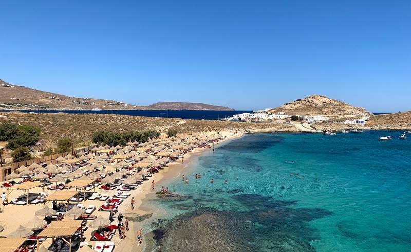 Foto af Agia Anna Strand med brunt sand overflade