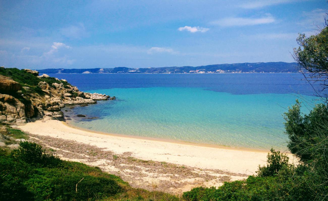 Foto af Agios Georgios Strand med lys sand overflade