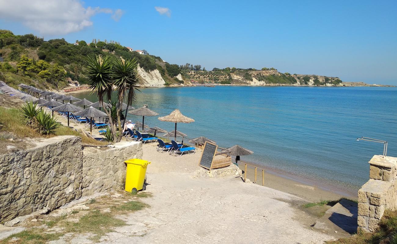 Foto af Porto Roma Beach med lys sand overflade