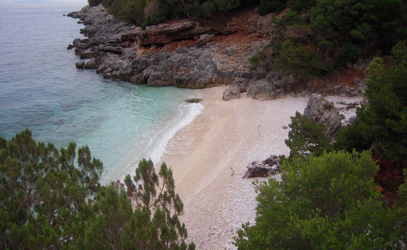 Foto af Dolcina beach med let sand og småsten overflade