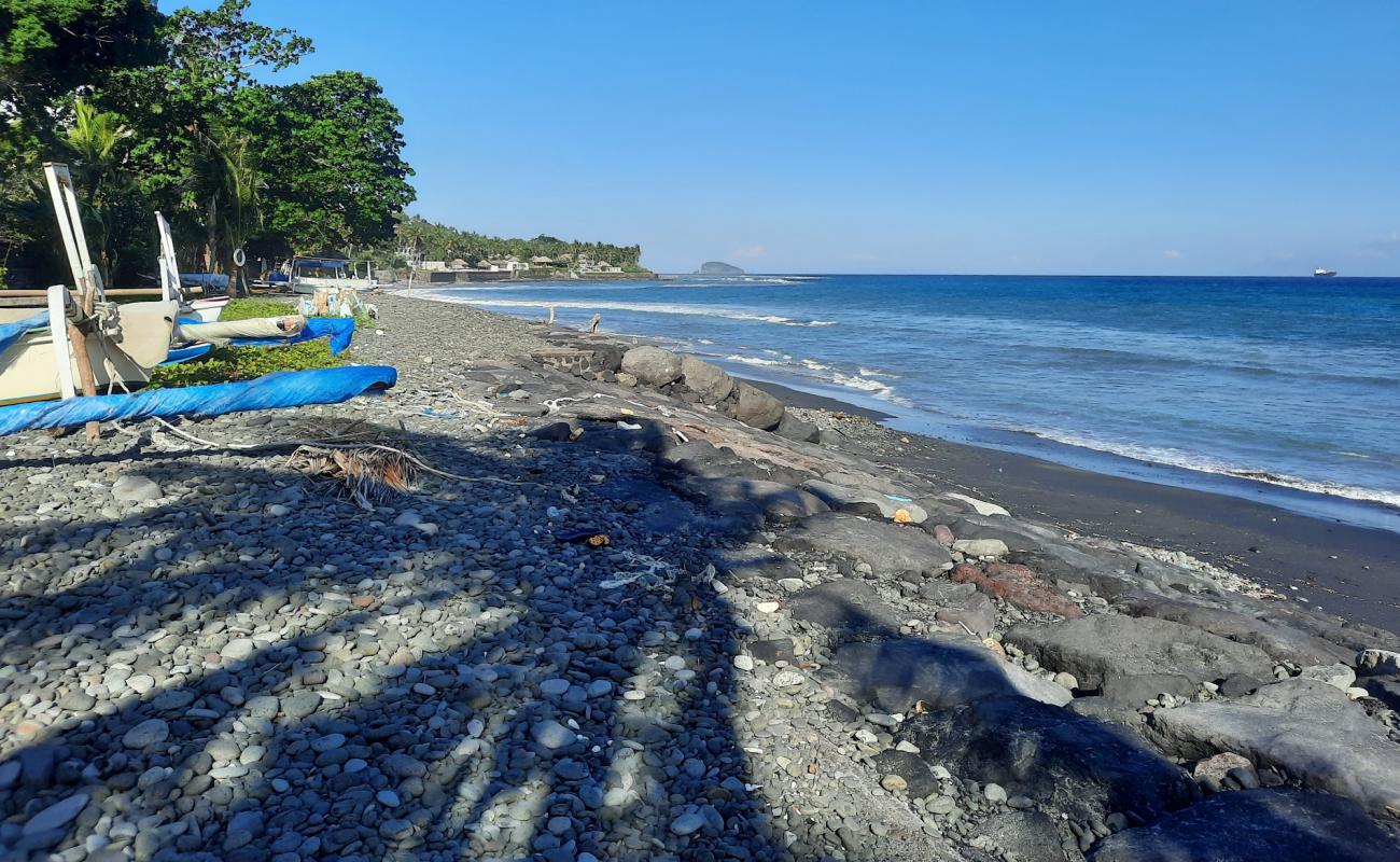 Foto af Buitan Beach med grå sten overflade