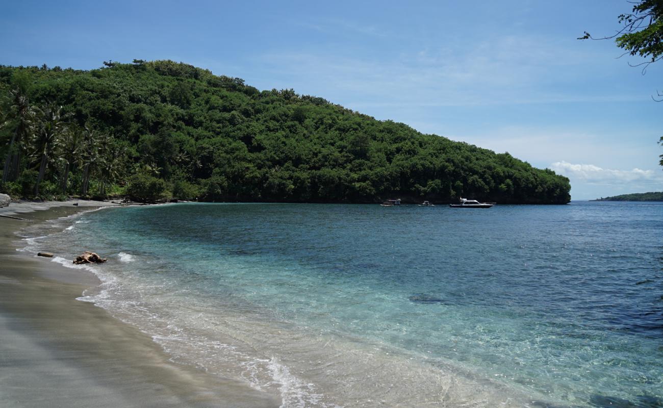 Foto af Gamat Bay med lys sand overflade