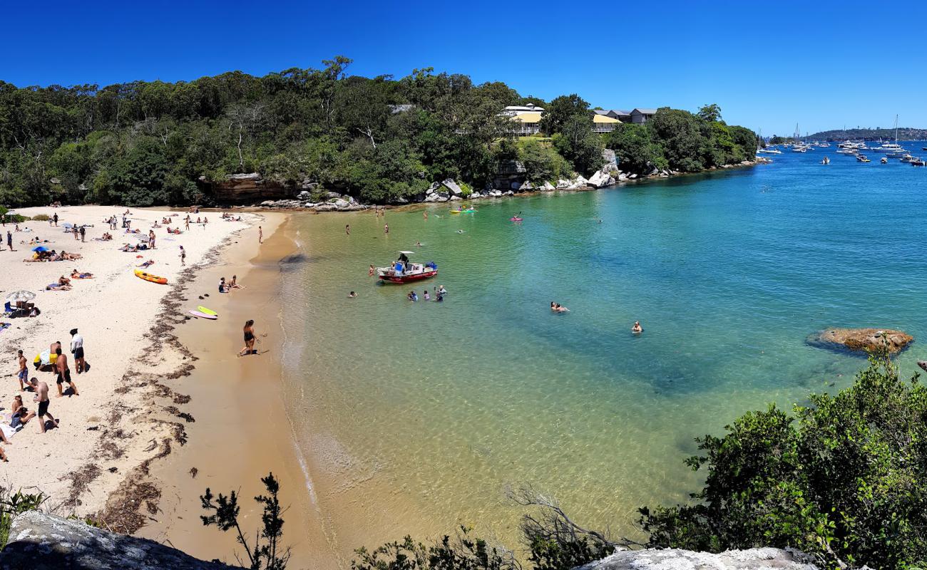 Foto af Collins Beach med lys sand overflade