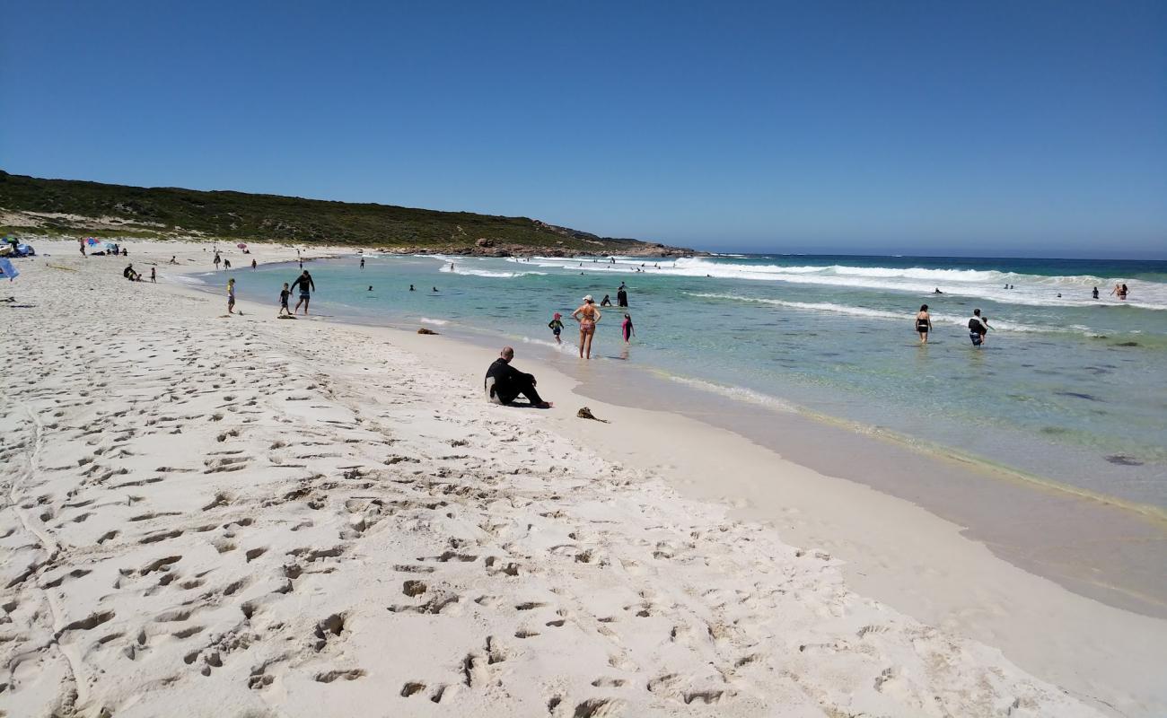 Foto af Redgate Beach med lys fint sand overflade