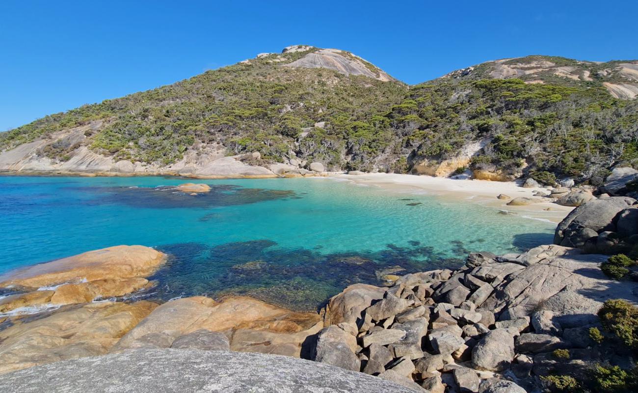 Foto af Waterfall Beach med hvidt fint sand overflade