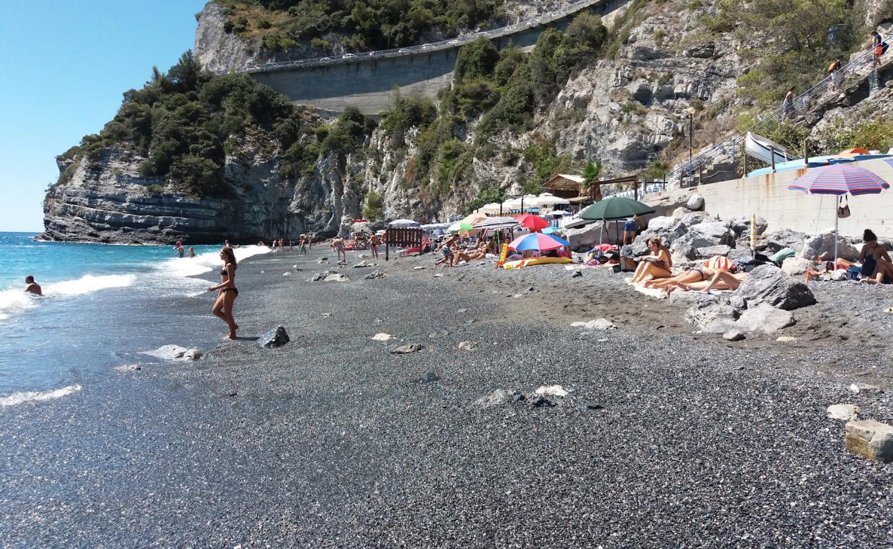 Foto af Sirene beach med brun fin sten overflade