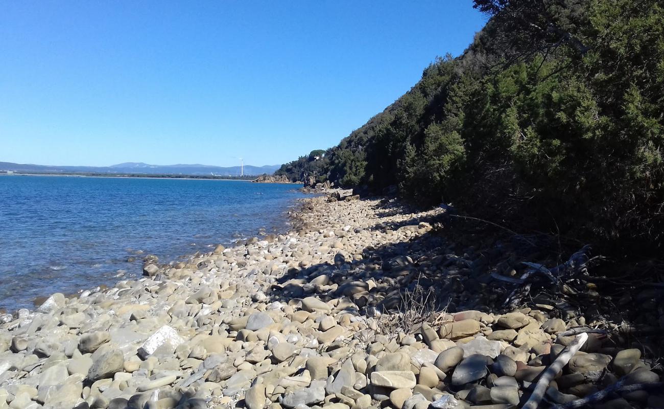 Foto af Cala Le Donne med sten overflade