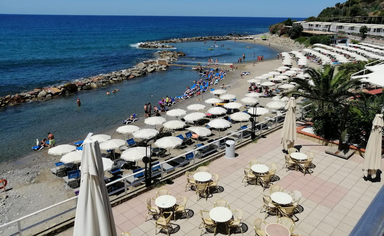 Foto af Baia del Silenzio med brunt sand overflade