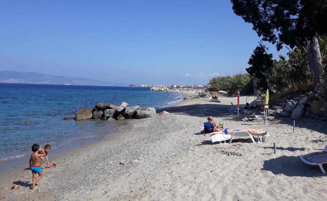 Foto af Costa di Pentimele med brunt sand overflade