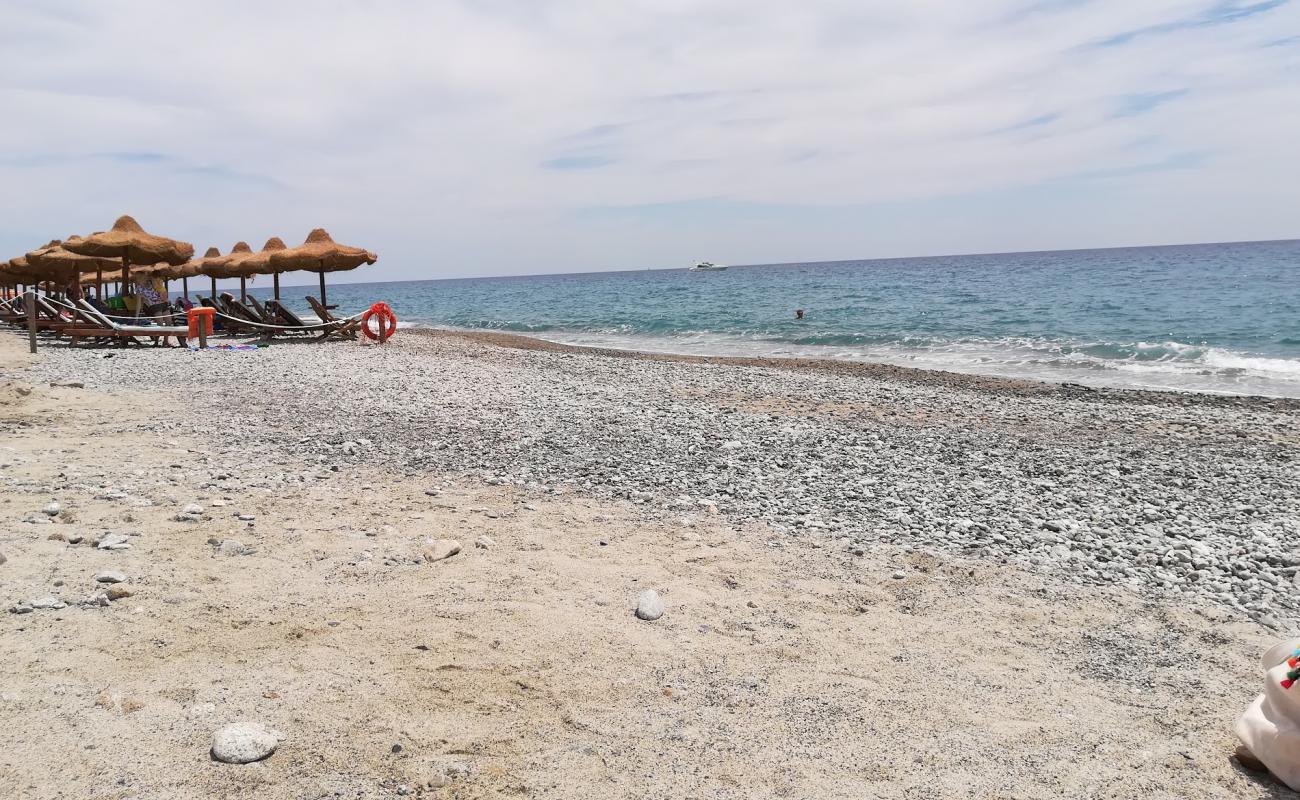 Foto af Riace Marina beach med brun fin sten overflade