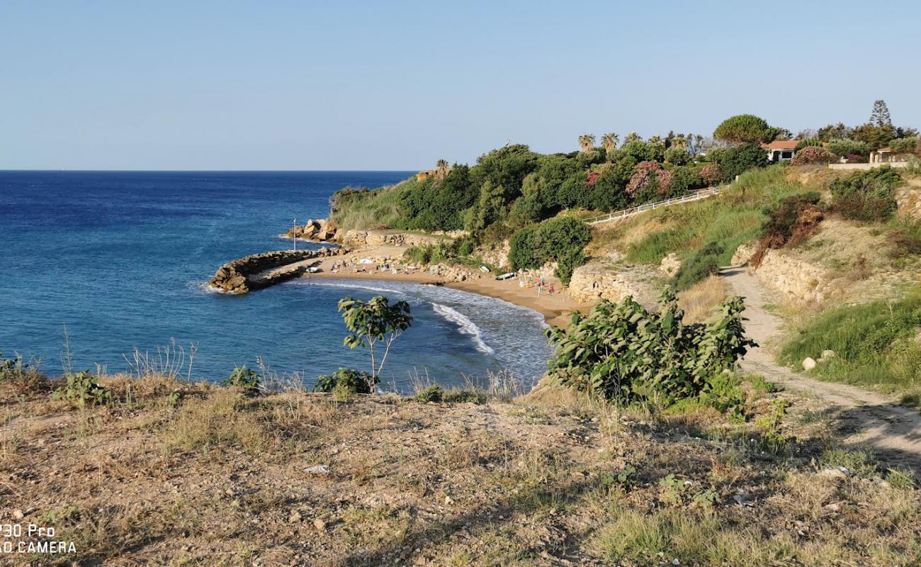 Foto af Spiaggia Capo Bianco med brunt sand overflade