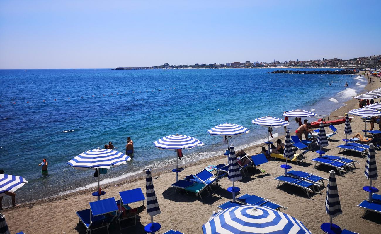 Foto af Giardini Naxos II med brun fin sten overflade