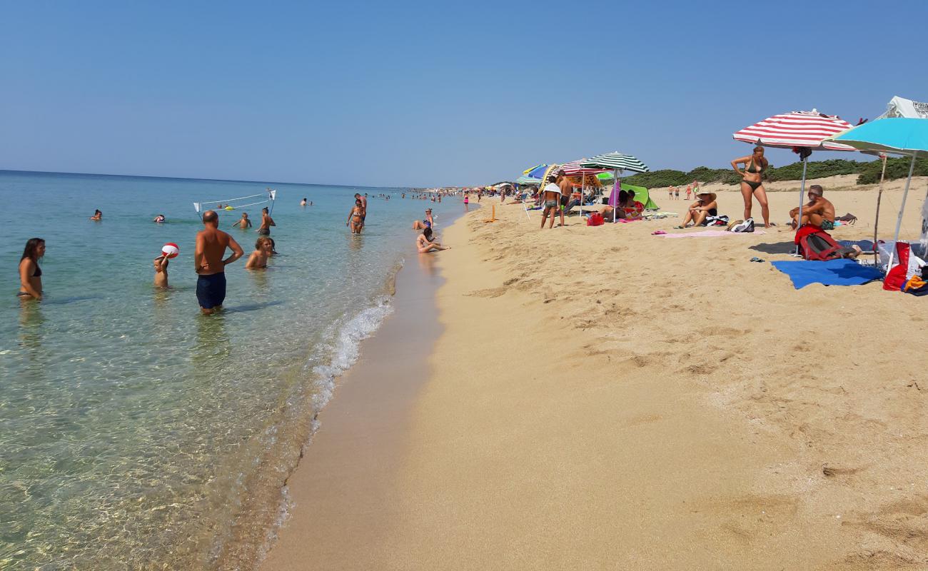 Foto af Torre Colimena beach med lys fint sand overflade