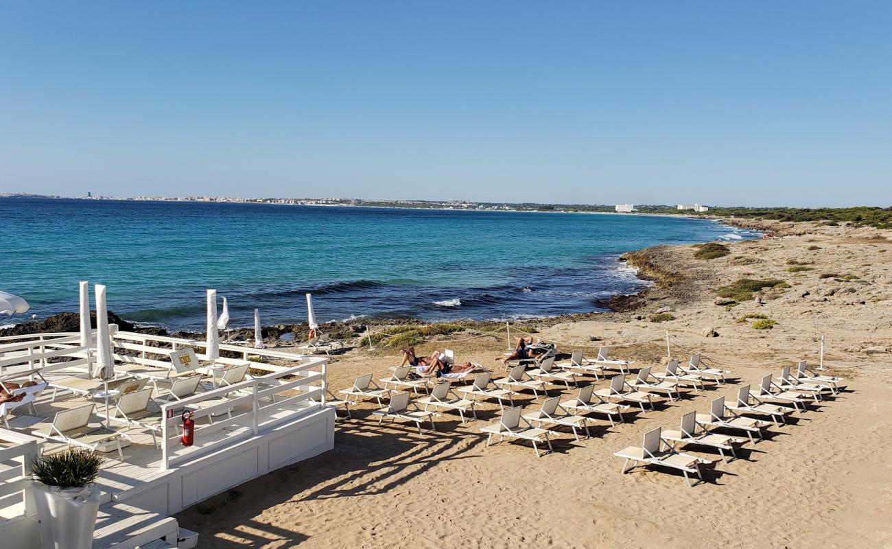 Foto af Spiaggia di Punta della Suina med betonovertræk overflade