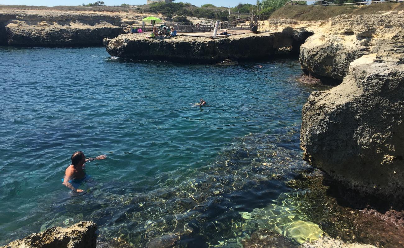 Foto af Cala di San Pietro med sten overflade