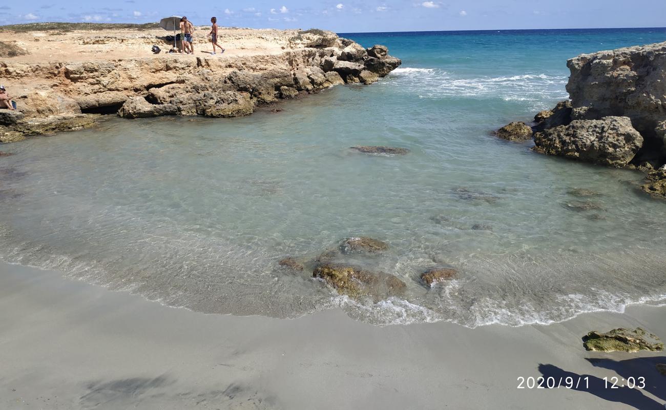 Foto af Caletta segreta med lys sand overflade