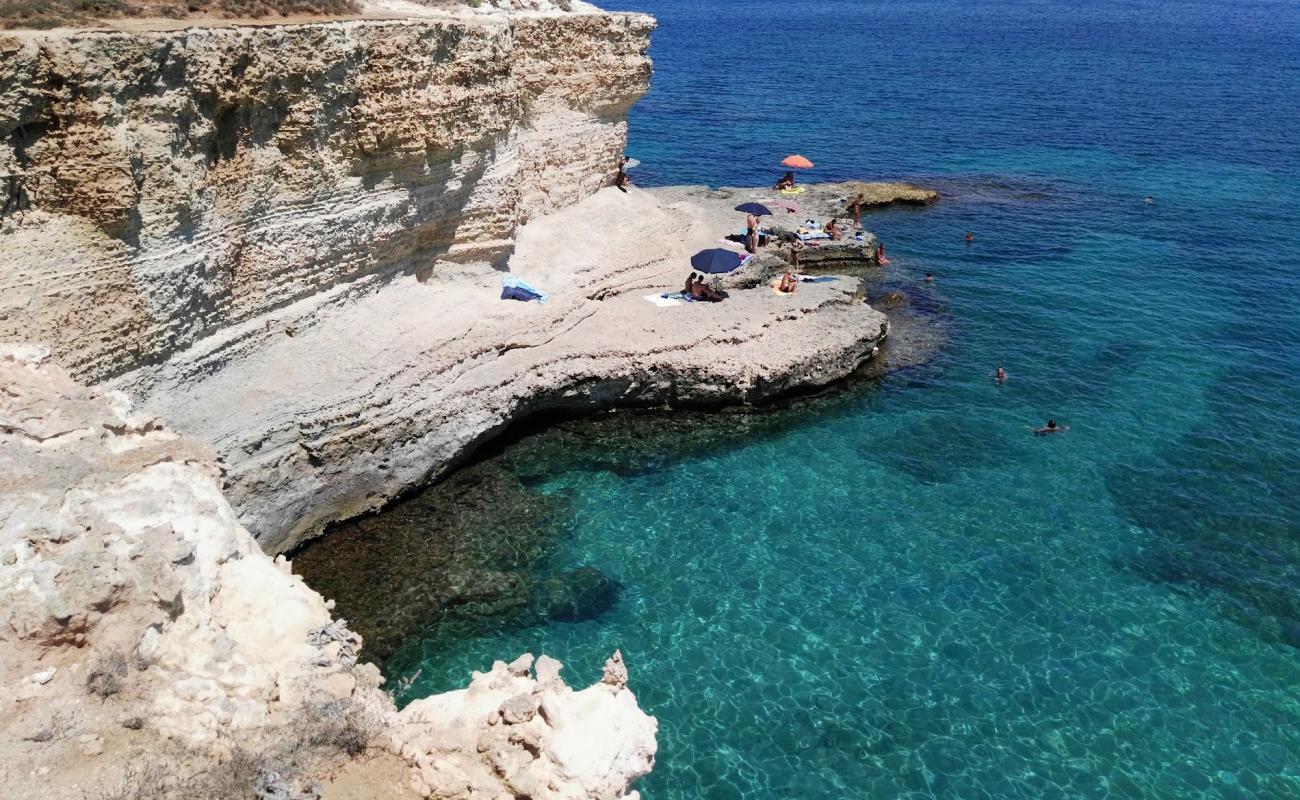 Foto af Spiaggia Torre Sant'Andrea med sten overflade