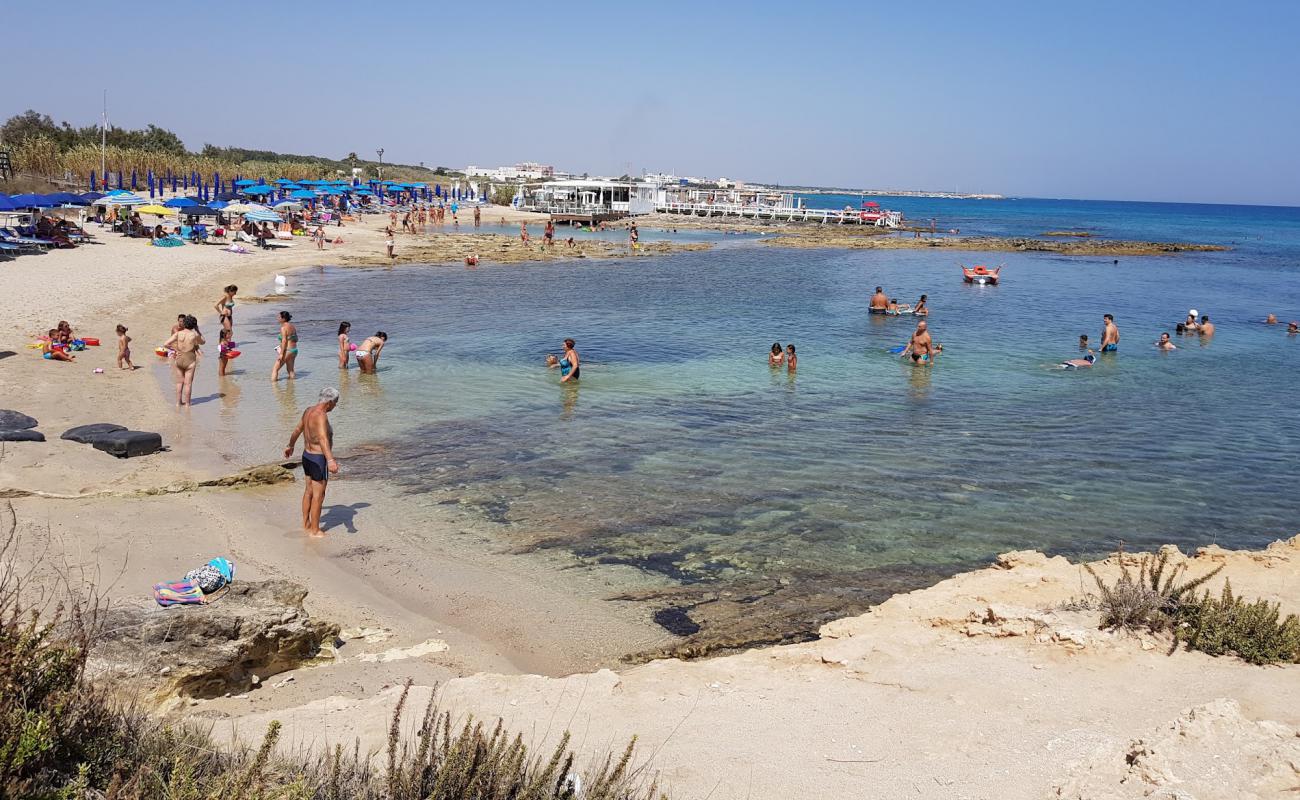 Foto af Kum beach med lys sand overflade