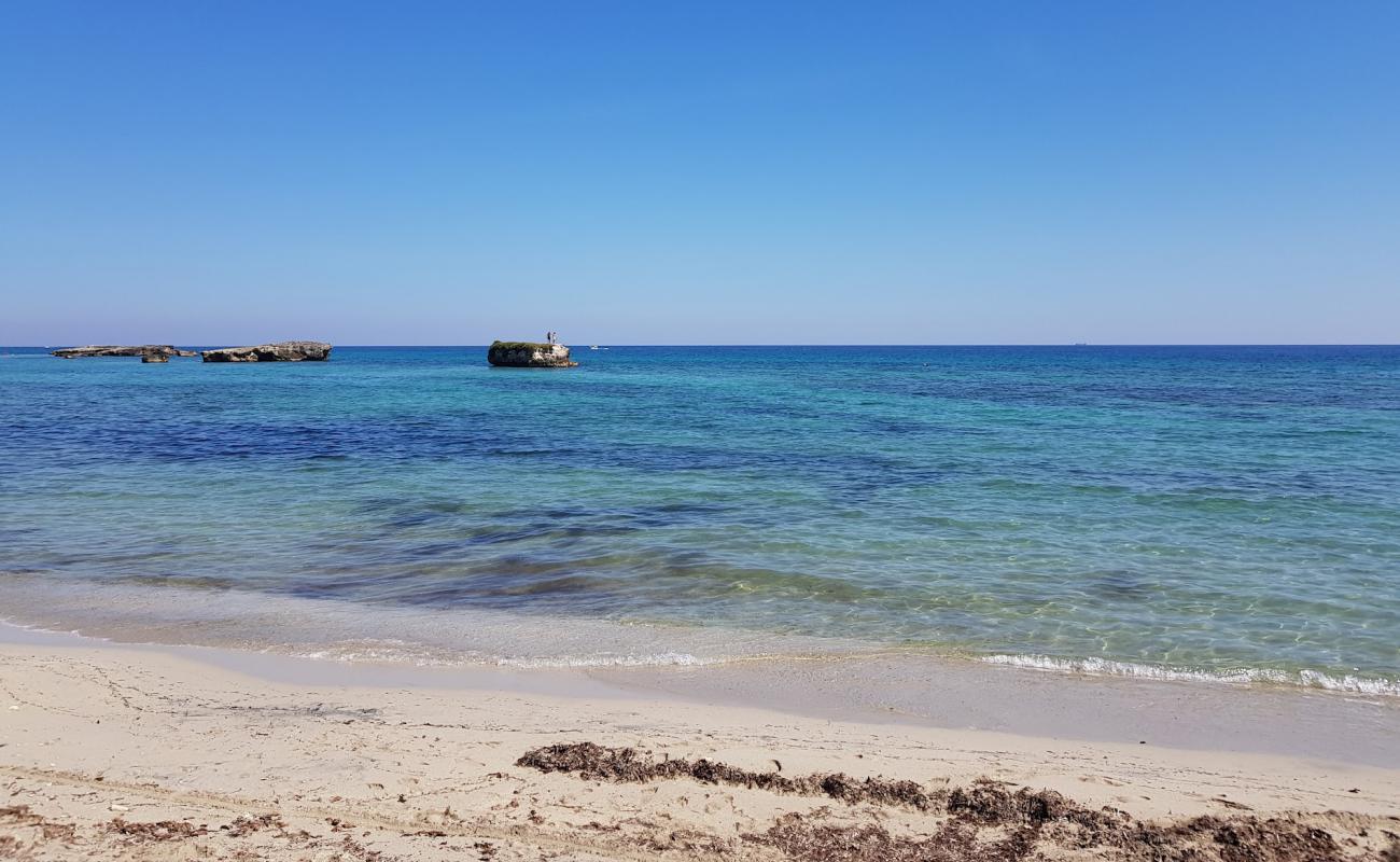 Foto af Spiaggia di Punta Cassano med lys sand overflade