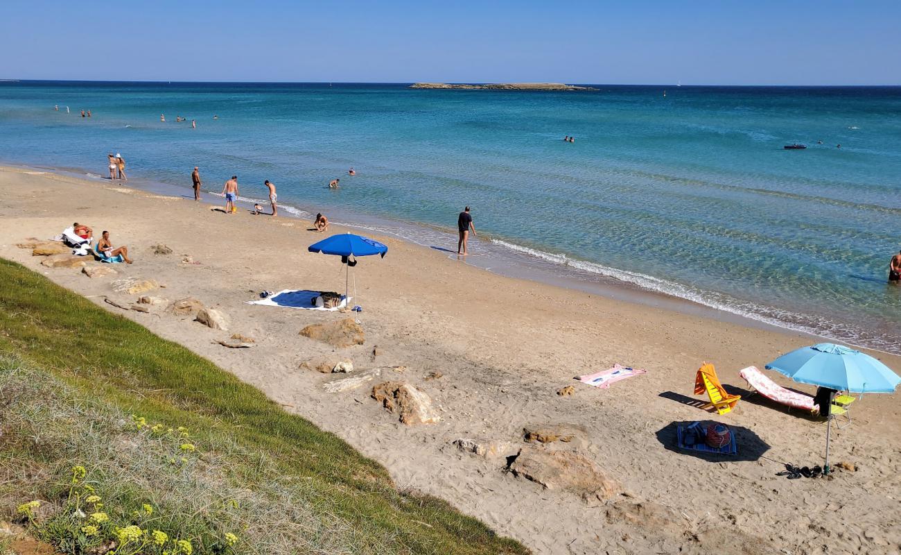 Foto af Posticeddu beach med lys fint sand overflade