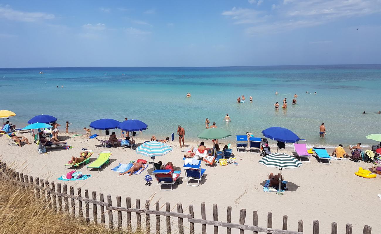 Foto af Spiaggia di Pilone med lys sand overflade