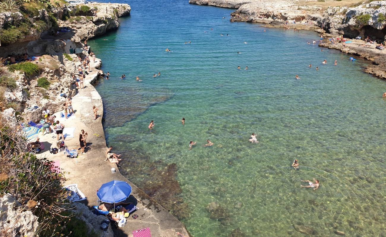 Foto af Cala Incine beach med lyst sand & sten overflade